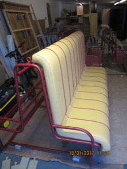 Upholstered seating with formed tube base
